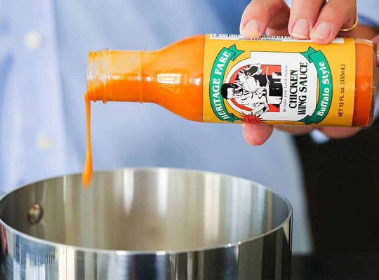 Kris Longwell and Wesley Loon from 'How To Feed A Loon' Make Buffalo Chicken Sandwich using Heritage Fare Chicken Wing Sauce